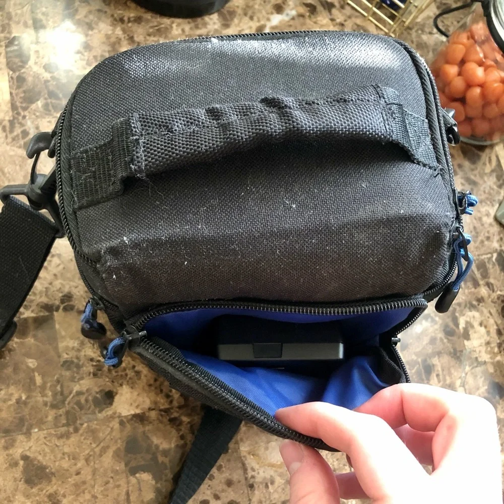 Nikon D3200, charger and case. Great digital camera for a present.